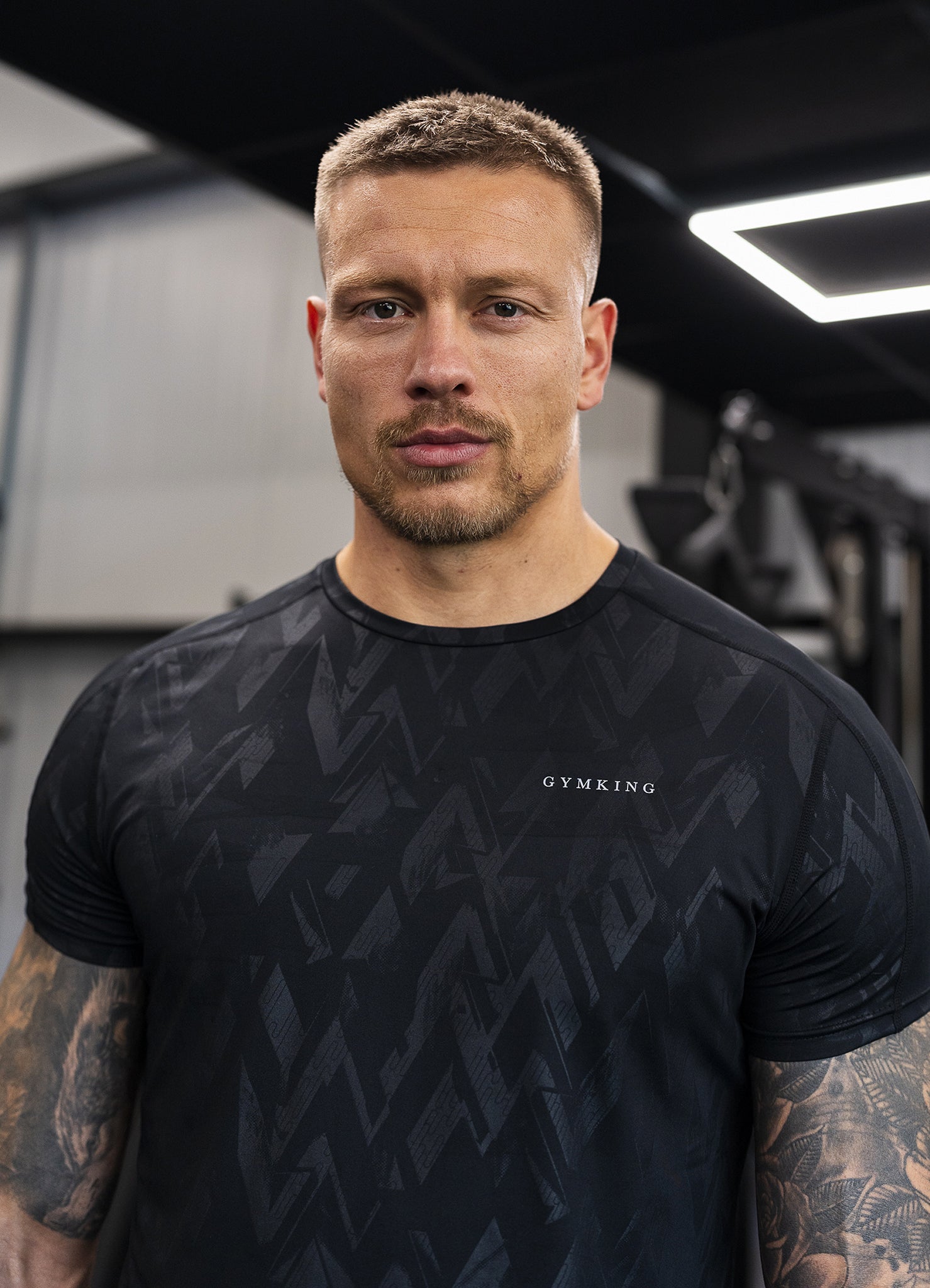 Gym King Debossed Peak Tee - Black Xs